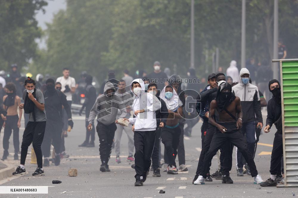 Protesters clash with police after the commemoration march for Nahel - Nanterre