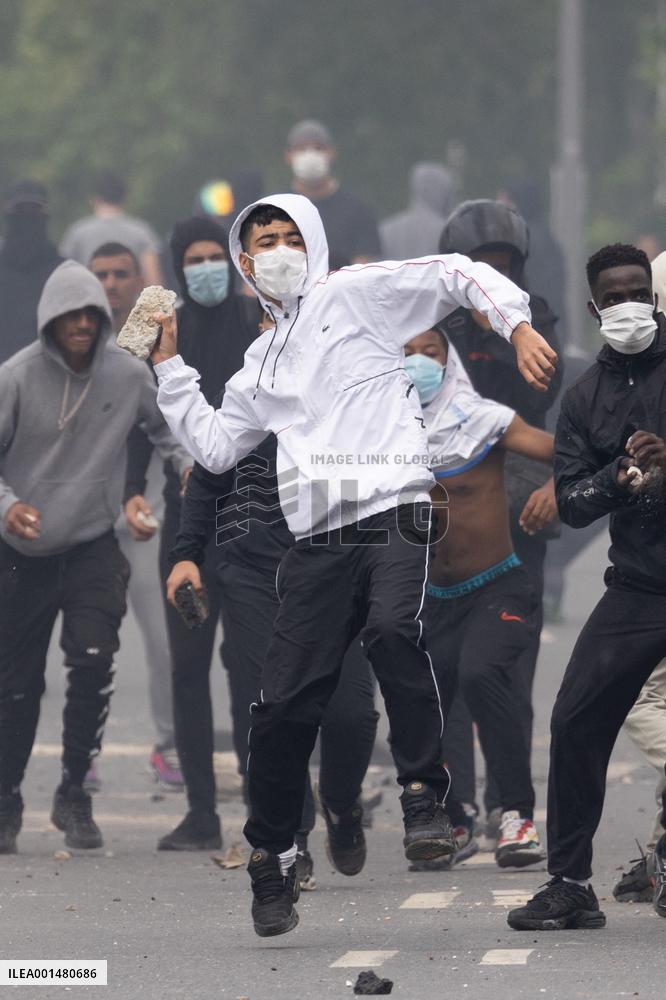 Protesters clash with police after the commemoration march for Nahel - Nanterre