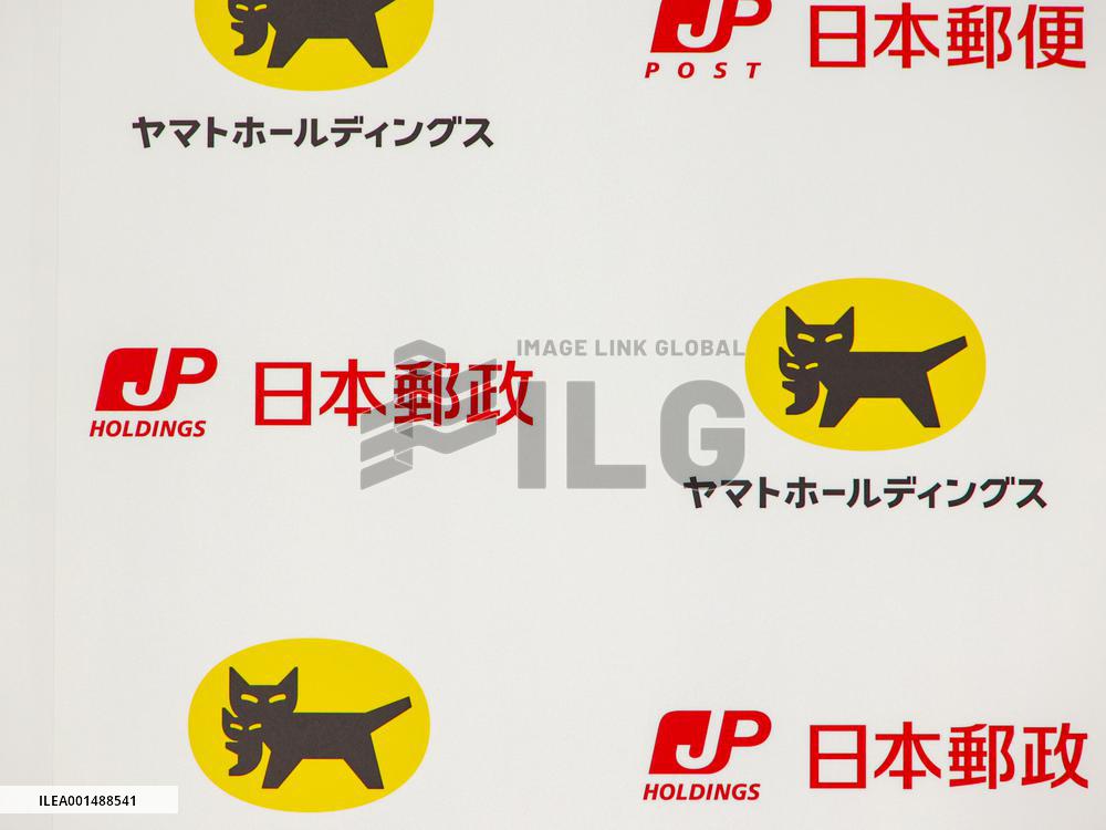 Logos of Japan Post and Yamato Holdings