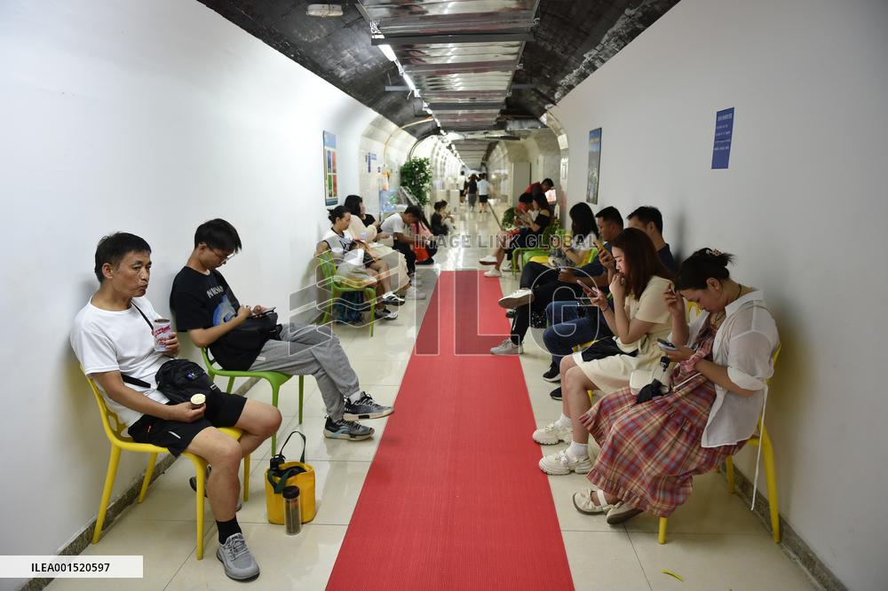 Citizens Cool Off in An Air-raid Shelter in Nanjing