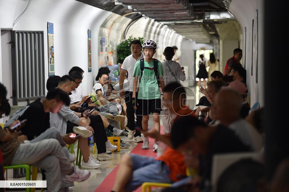 Citizens Cool Off in An Air-raid Shelter in Nanjing