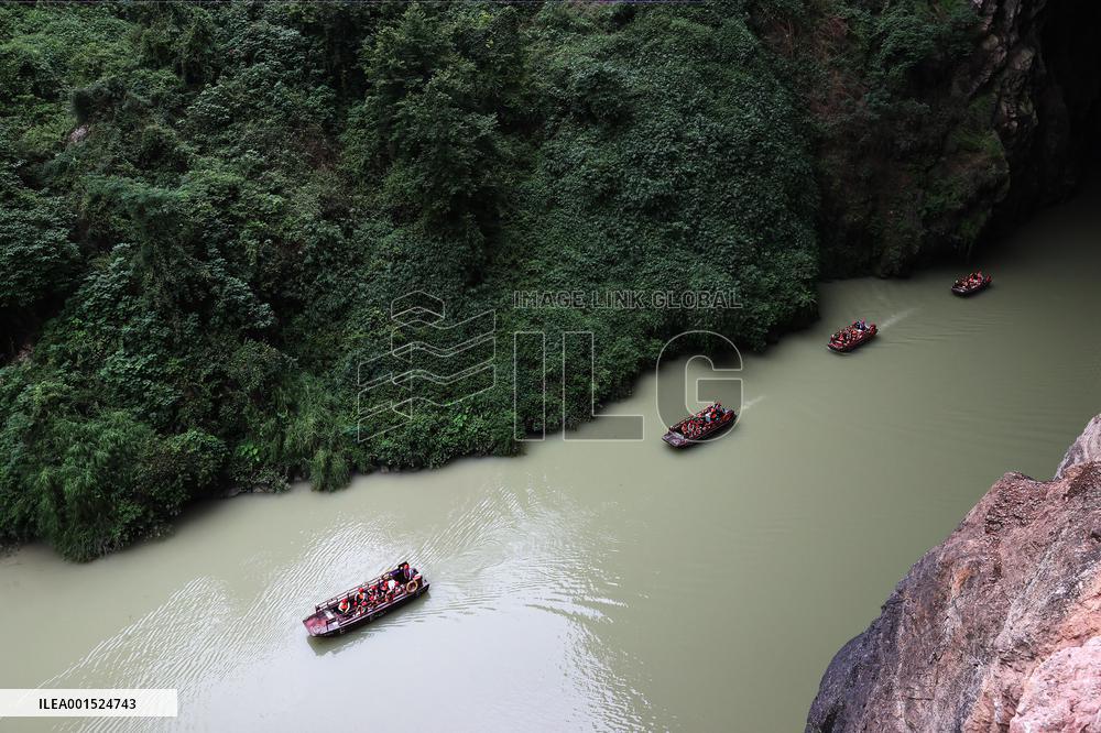 Tourists Cross The Hidden River By Boat To Escape The Heat in Chongqing