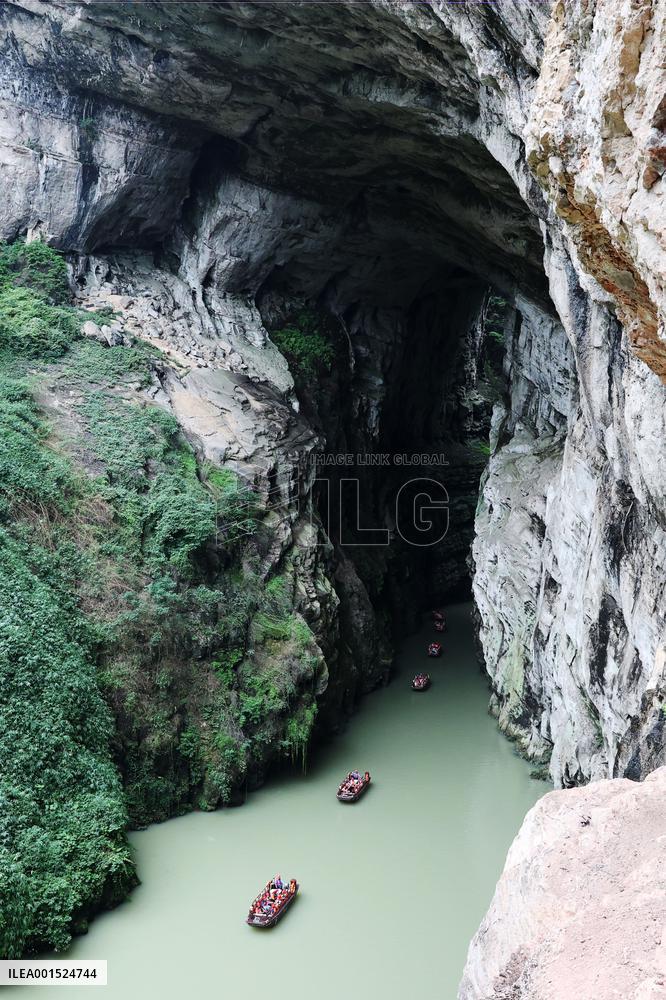 Tourists Cross The Hidden River By Boat To Escape The Heat in Chongqing