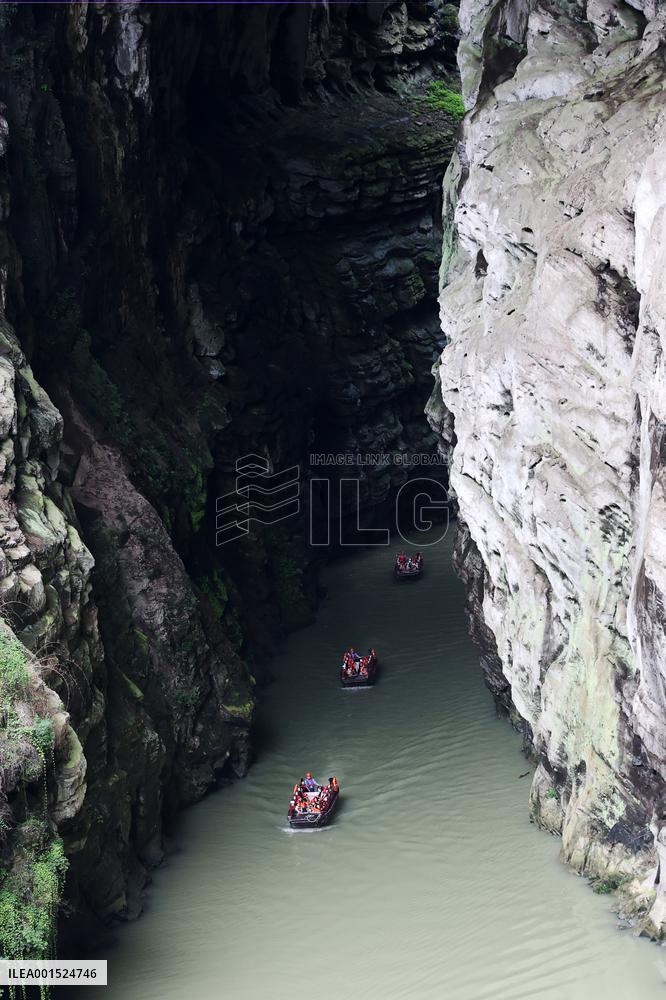 Tourists Cross The Hidden River By Boat To Escape The Heat in Chongqing