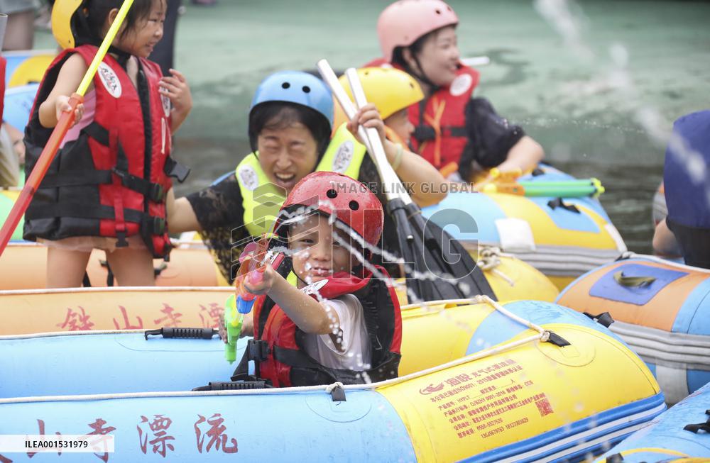 Tourists Experience River Rafting in Huai'an