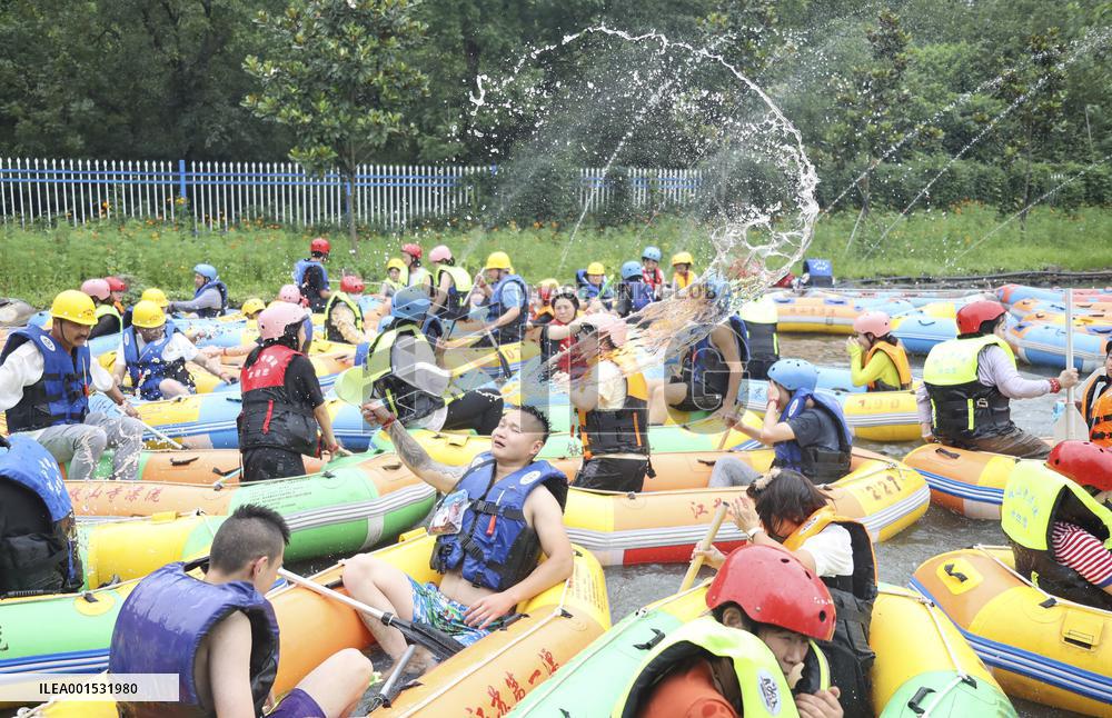 Tourists Experience River Rafting in Huai'an