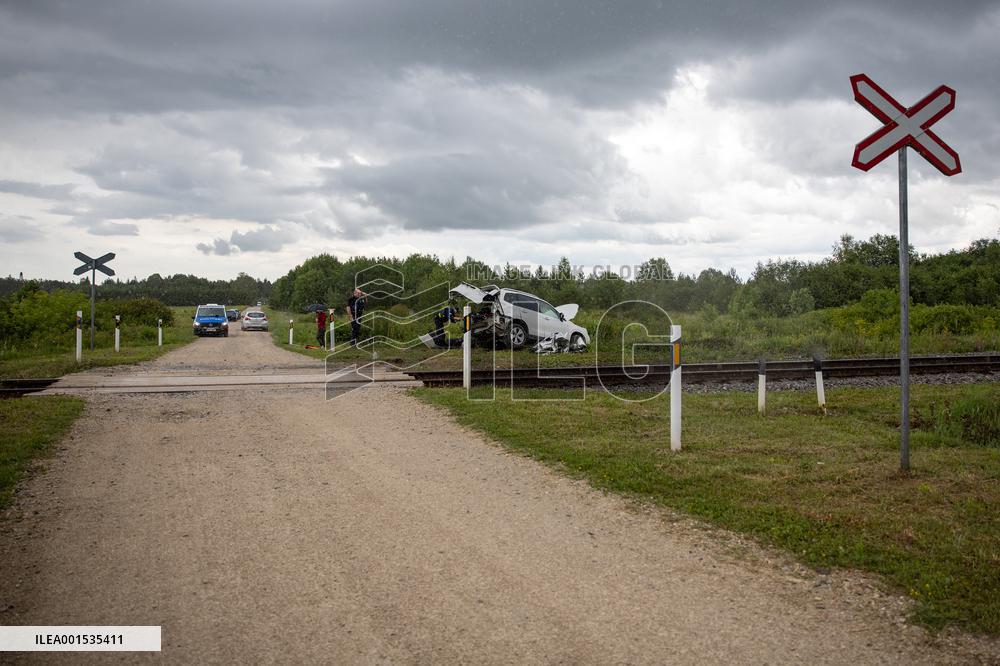 Crash between car and train