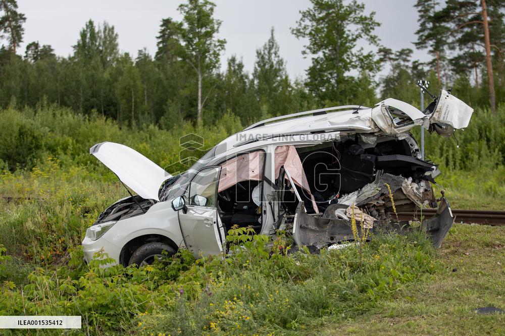 Crash between car and train