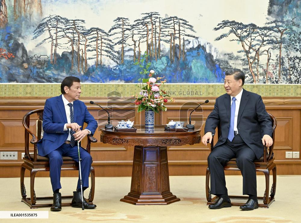 CHINA-BEIJING-XI JINPING-FORMER PHILIPPINE PRESIDENT-MEETING (CN)