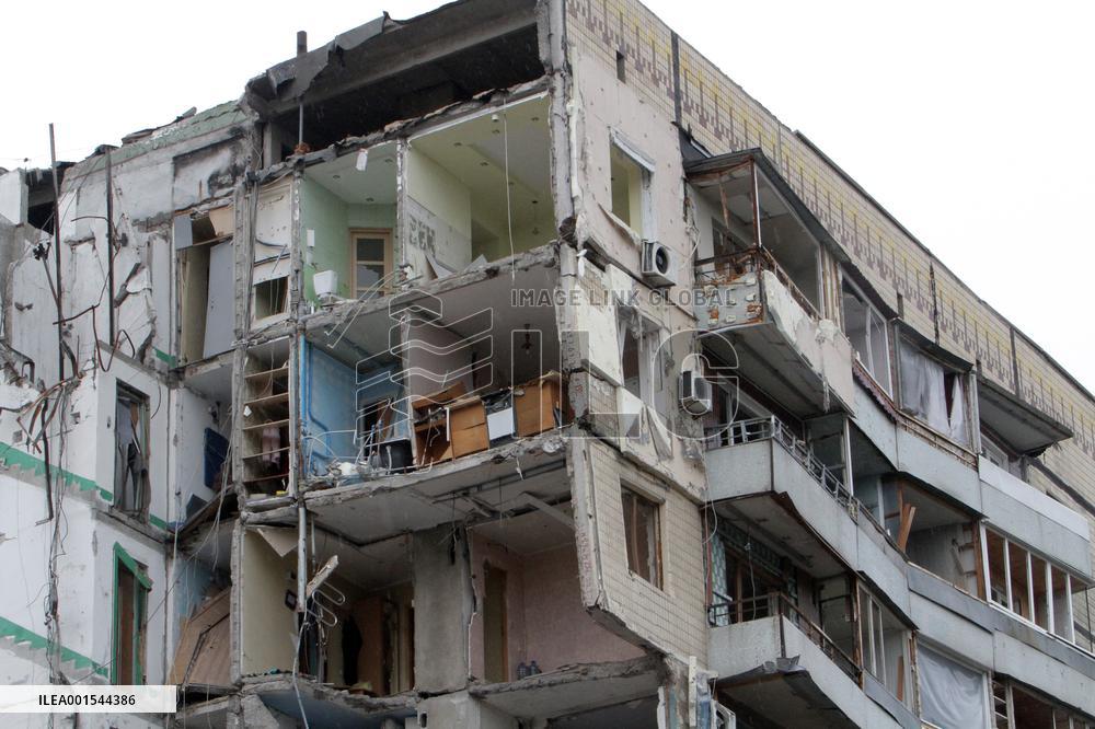 Flowers planted outside residential building bombed by Russians and murals created on walls of surviving blocks In Dnipro