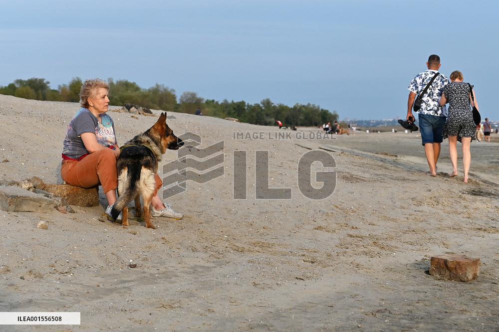 Relaxing at shallow bank of Dnipro River