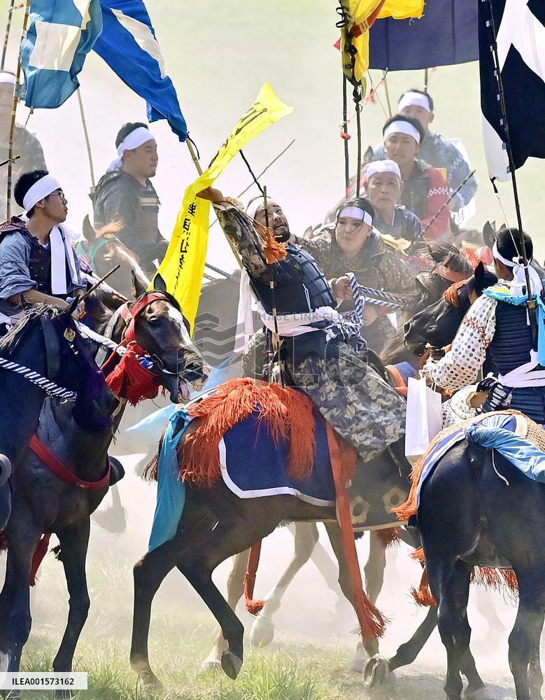 Armored warriors compete in horse race