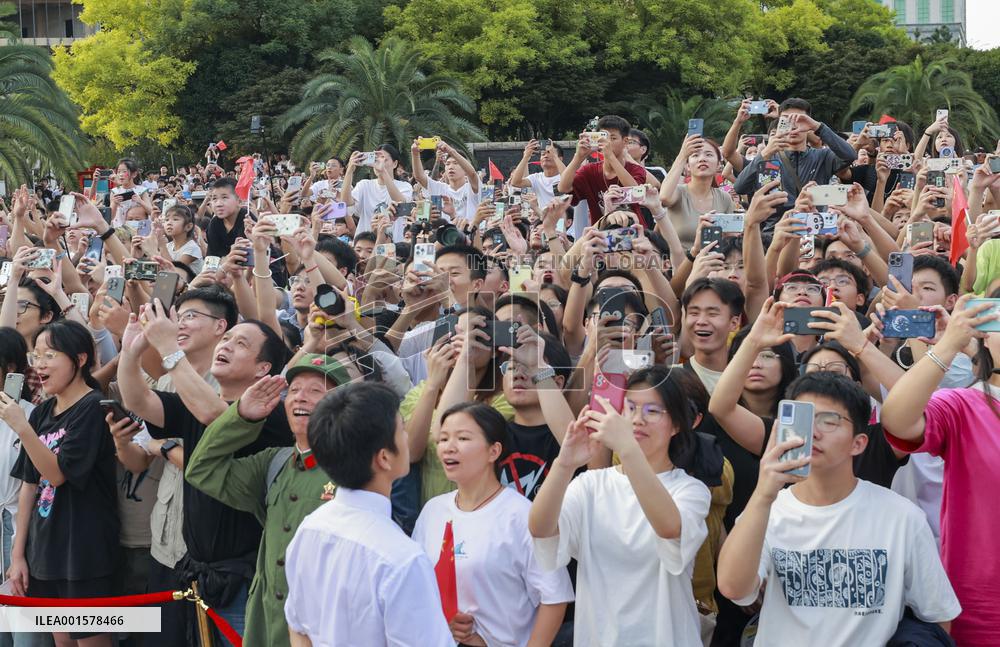 People Watched The National Flag Raising Ceremony in Nanchang, China