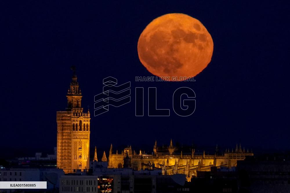 Supermoon Rises Over The Giralda - Seville
