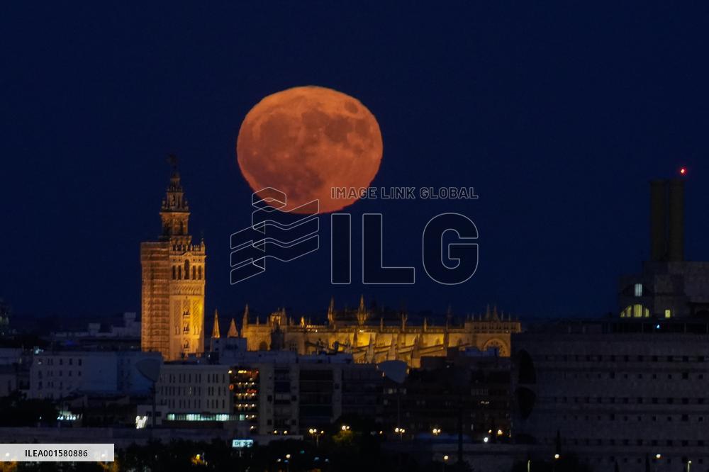 Supermoon Rises Over The Giralda - Seville