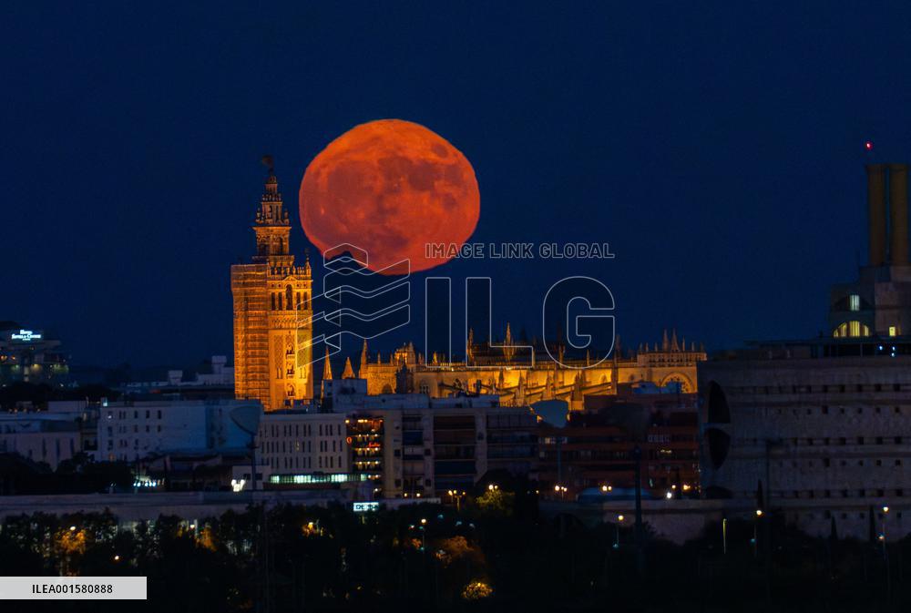 Supermoon Rises Over The Giralda - Seville