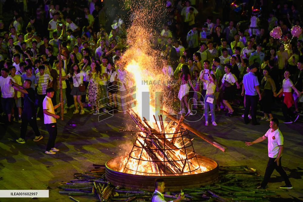 Yi Ethnic Torch Festival Marked in Qianxinan, China