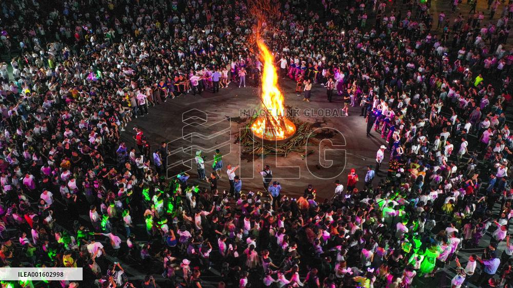 Yi Ethnic Torch Festival Marked in Qianxinan, China