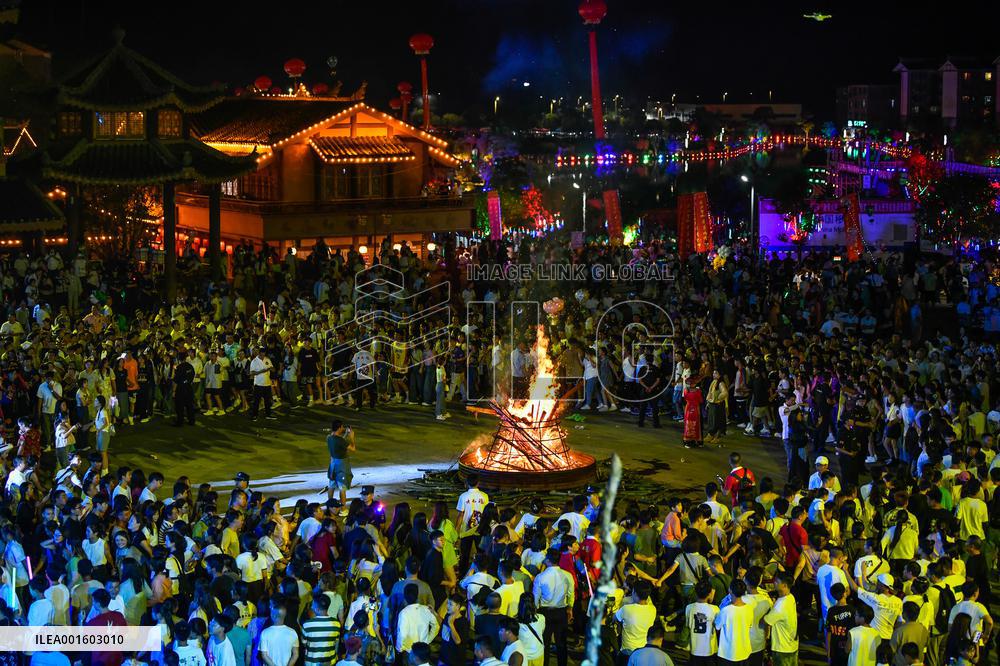 Yi Ethnic Torch Festival Marked in Qianxinan, China