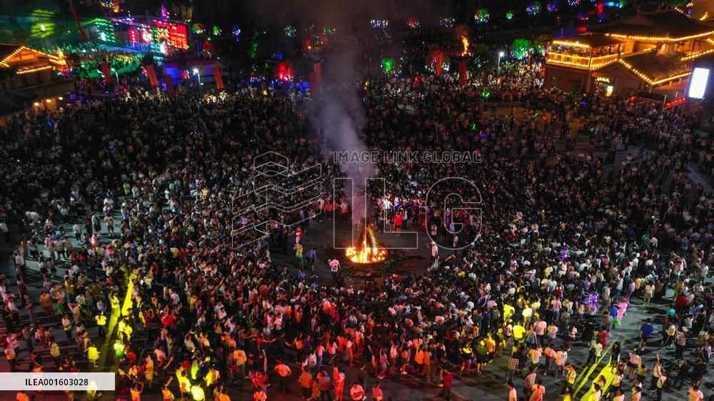 Yi Ethnic Torch Festival Marked in Qianxinan, China
