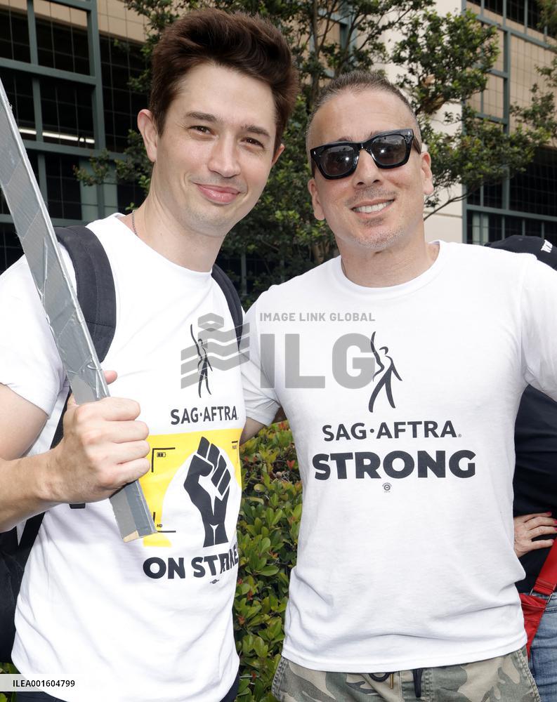 SAG AFTRA-WGA Strike outside Warner Brothers Studios - Burbank