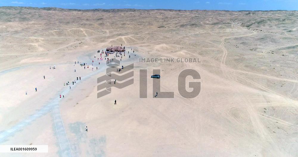 The Sculpture Son of the Earth on The Gobi Beach in Guazhou