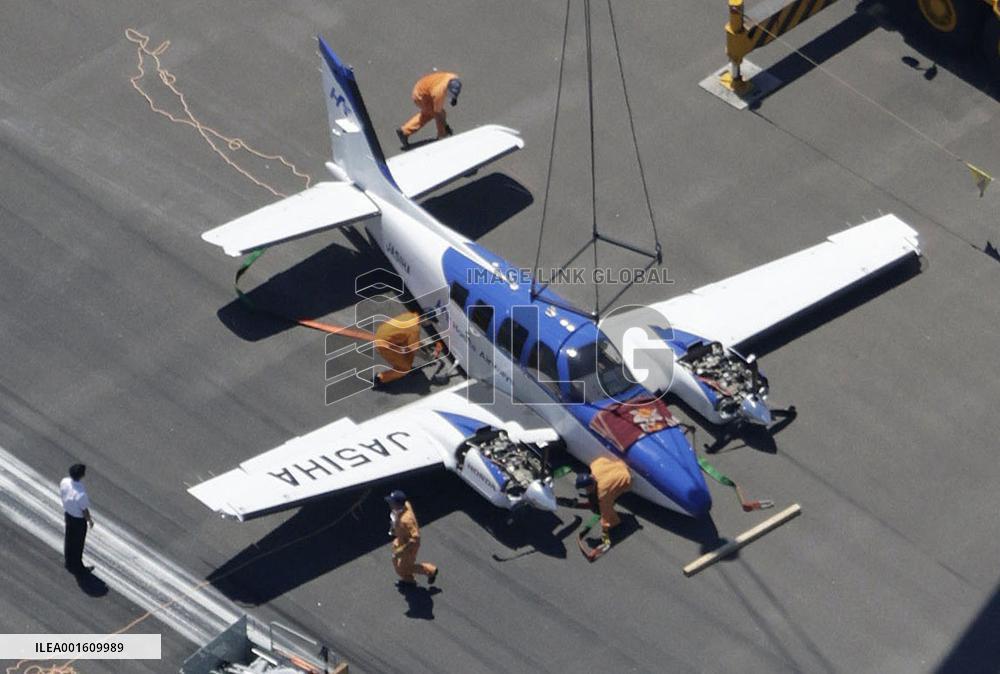 Light plane crash lands at Oita airport