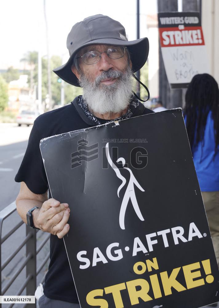 SAG-AFTRA And WGA Strike Outside Paramount Studios - LA