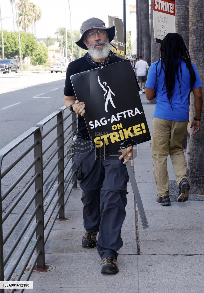 SAG-AFTRA And WGA Strike Outside Paramount Studios - LA