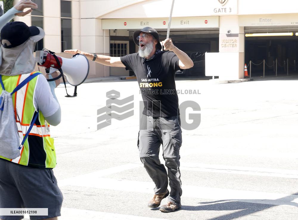SAG-AFTRA And WGA Strike Outside Paramount Studios - LA