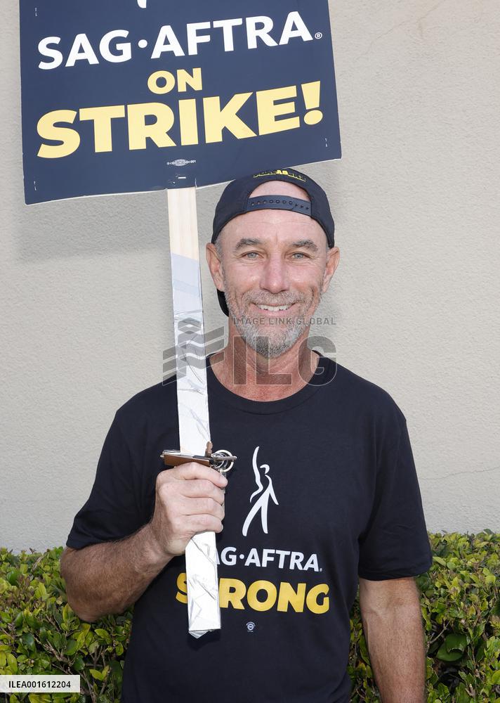 SAG-AFTRA And WGA Strike Outside Paramount Studios - LA