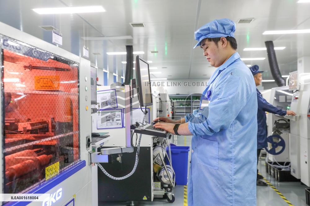 Workers Produce Integrated Circuit Chips in A Smart Workshop
