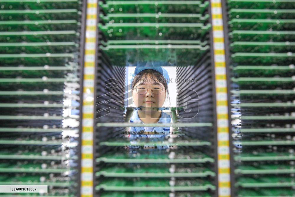 Workers Produce Integrated Circuit Chips in A Smart Workshop