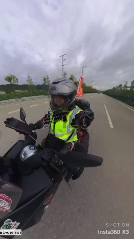 62-year-old Chinese woman takes motorcycle adventure to Tibet