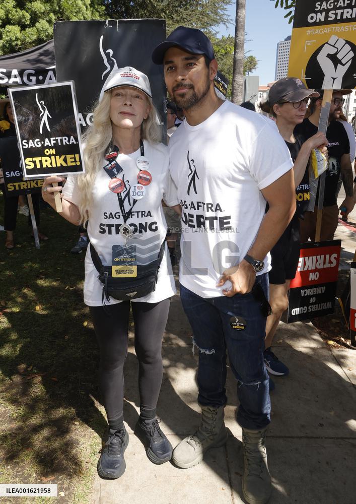 SAG-AFTRA and WGA Strike outside Warner Bros - LA