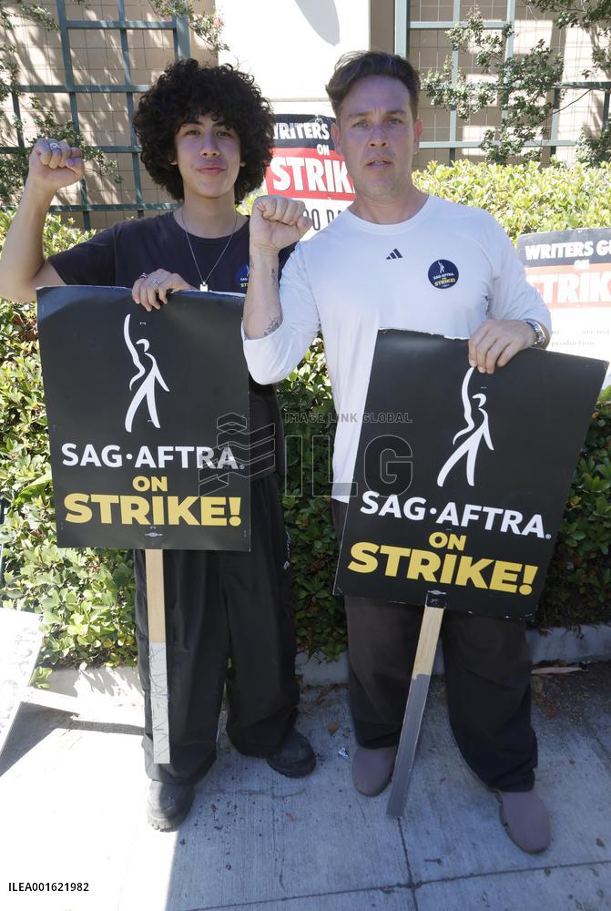 SAG-AFTRA and WGA Strike outside Warner Bros - LA