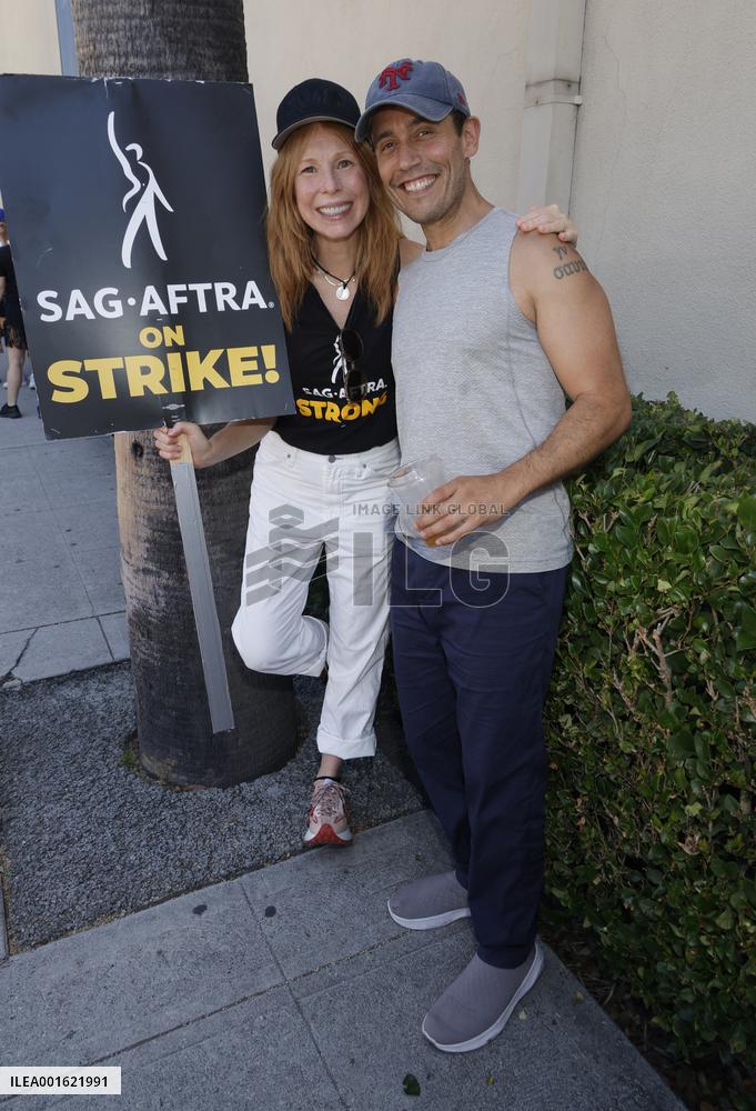 SAG-AFTRA and WGA Strike outside Warner Bros - LA