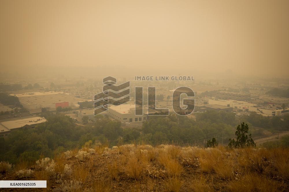 Western Canada Wildfires Force Tens Of Thousands To Flee