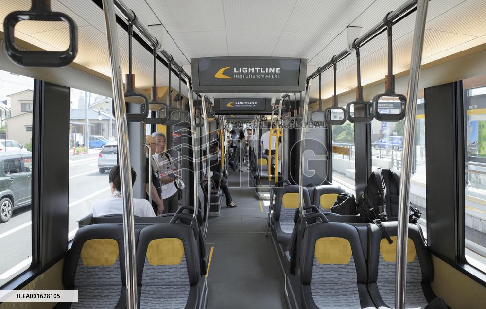 Media ride of LRT train in eastern Japan