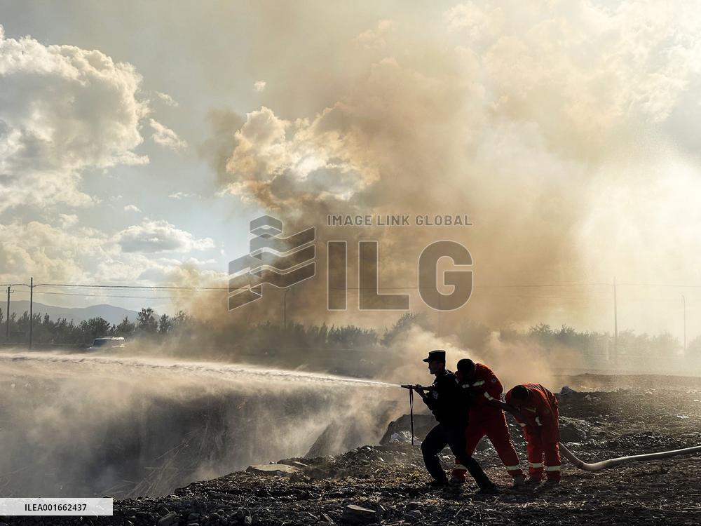 Extinguishing Burning Garbage Dump in Altay