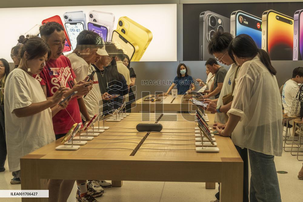 Customers Experience Apple Products at An Apple Store in Chengdu, China