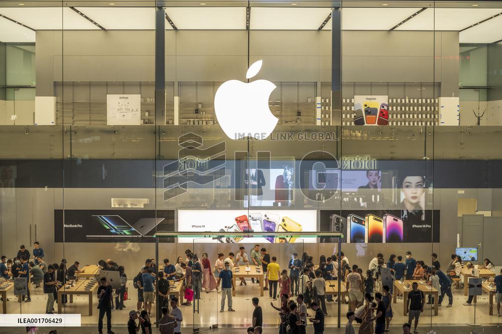 Customers Experience Apple Products at An Apple Store in Chengdu, China
