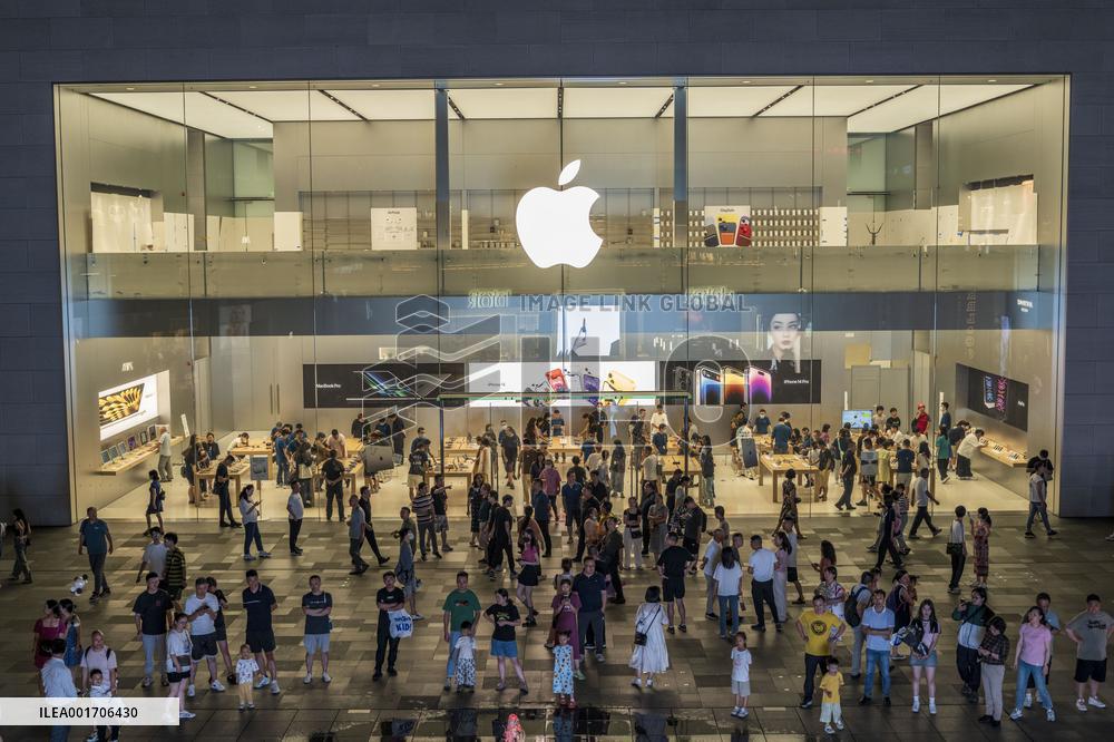 Customers Experience Apple Products at An Apple Store in Chengdu, China