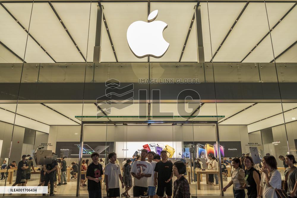 Customers Experience Apple Products at An Apple Store in Chengdu, China