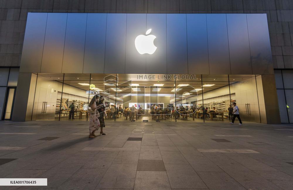 Customers Experience Apple Products at An Apple Store in Chengdu, China