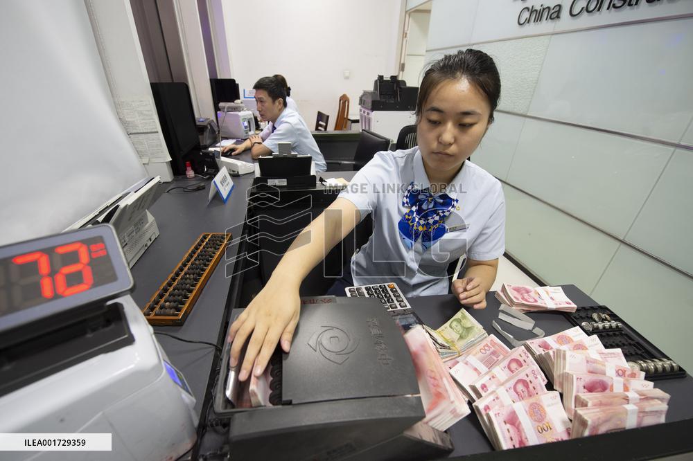 The People's Bank of China Lowered The Reserve Requirement Ratio For Financial Institutions