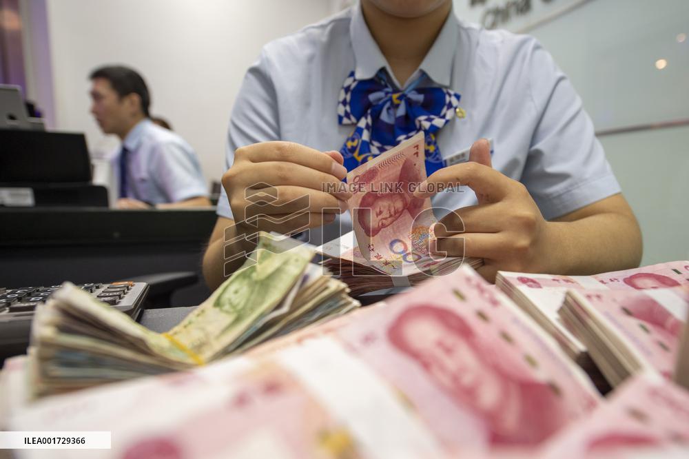 The People's Bank of China Lowered The Reserve Requirement Ratio For Financial Institutions