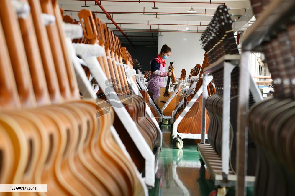 CHINA-BELT AND ROAD INITIATIVE-GUITAR-MAKING INDUSTRY (CN)