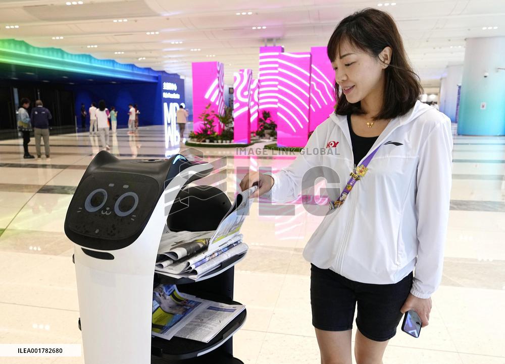 Asian Games: Newspaper delivery robot