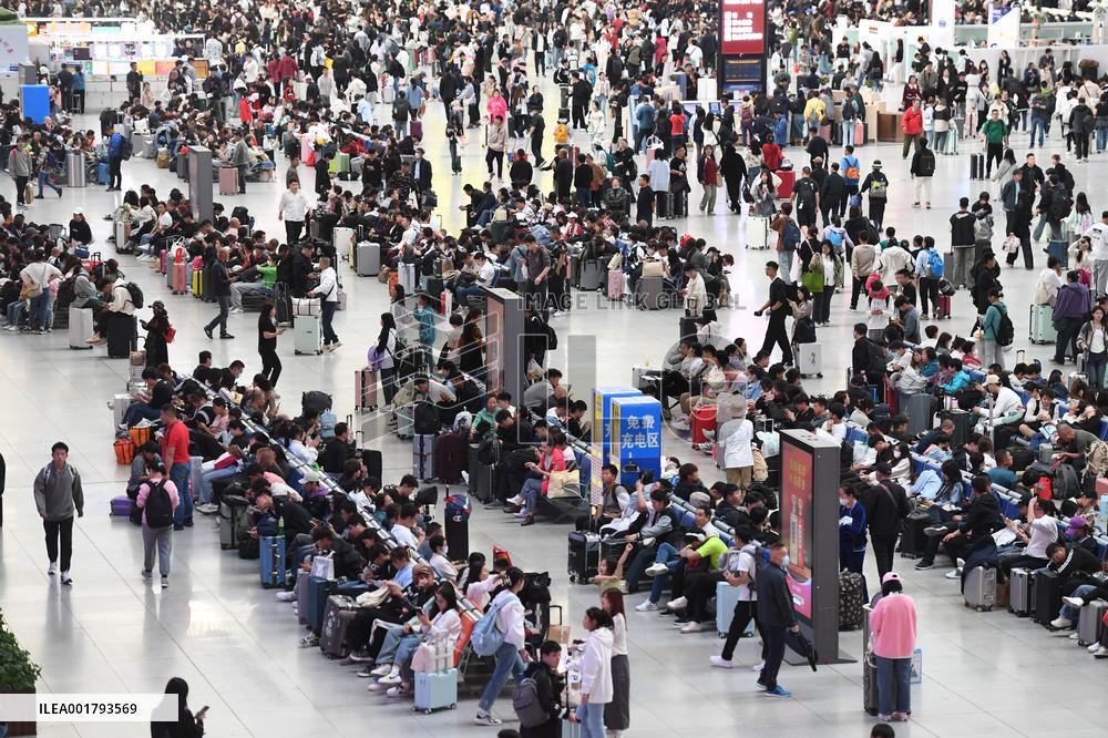 Tourists Line Up at Changchun Railway Station in Changchun
